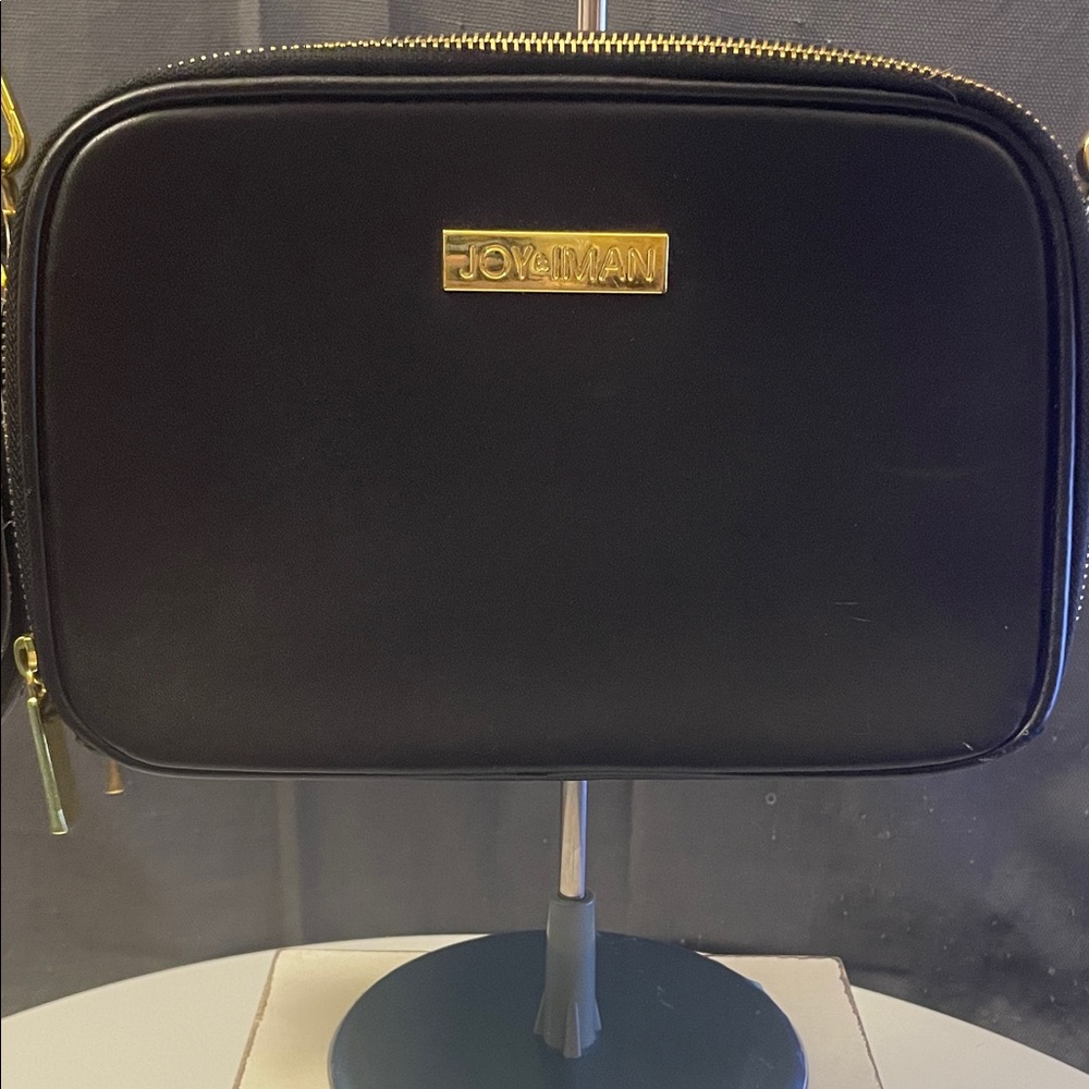 Elegant Black Crossbody Bag with Gold Accents - Picture 2 of 11
